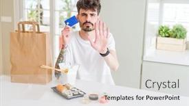  Presentation with payment - Amazing presentation having young man eating asian sushi from home delivery using credit card as payment with open hand doing stop sign with serious and confident expression defense gesture backdrop and a light gray colored foreground