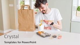  Presentation with food delivery - Theme with young man eating sushi asian food and noodles using choopsticks from take away delivery background and a soft green colored foreground