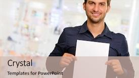  Presentation with blank - Amazing theme having young man holding blank paper backdrop and a soft green colored foreground