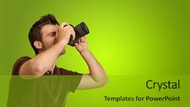  Presentation with green officebuilding man - Colorful presentation theme enhanced with young man holding camera on green background backdrop and a gold colored foreground