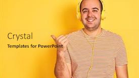  Presentation with yellow music - Beautiful theme featuring young man listening to music using headphones standing over isolated yellow background smiling with happy face looking and pointing to the side with thumb up backdrop and a yellow colored foreground