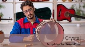  Presentation with workshop - PPT layouts featuring young-man-repairing-musical-instruments background and a coral colored foreground