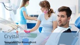  Presentation with dentist - Presentation theme enhanced with young-man-sitting-in-dentist background and a light blue colored foreground