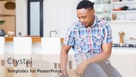  Presentation with social isolation - Slides consisting of young man sitting on table using laptop in kitchen at home working from home in quarantine lockdown social distancing self isolation background and a soft green colored foreground