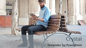  Presentation with man sitting bench - PPT layouts featuring young-man-uses-a-tablet background and a light gray colored foreground