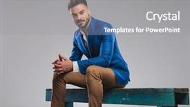 Presentation with man sitting bench - Colorful PPT theme enhanced with young man wearing blue backdrop and a gray colored foreground