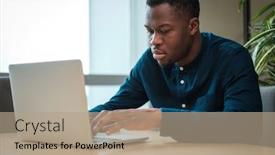  Presentation with public - Amazing PPT theme having young man working on a laptop in public library backdrop and a coral colored foreground