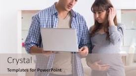  Presentation with expecting parents - PPT layouts enhanced with young-parents-expecting-their-first background and a mint green colored foreground