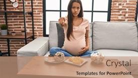  Presentation with sweets - Slide set featuring young-pregnant-woman-eating-sweets background and a coral colored foreground