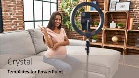  Presentation with pregnant woman - Presentation theme featuring young-pregnant-woman-recording-vlog background and a light gray colored foreground