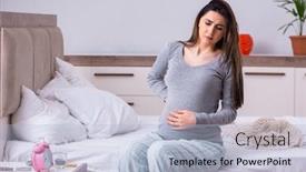  Presentation with pregnant woman - Audience pleasing presentation theme consisting of young pregnant woman in the bedroom backdrop and a light blue colored foreground