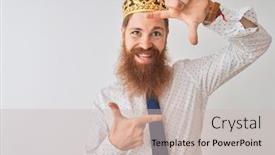  Presentation with king crown - Beautiful slide set featuring young redhead irish businessman wearing crown king over isolated white background smiling making frame with hands and fingers with happy face creativity and photography concept backdrop and a soft green colored foreground