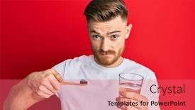  Presentation with toothpaste - Audience pleasing PPT theme consisting of young-redhead-man-holding-toothbrush backdrop and a coral colored foreground