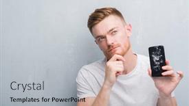  Presentation with broken wall - PPT theme consisting of young redhead man over grey grunge wall holding broken smartphone serious face thinking about question very confused idea background and a light gray colored foreground
