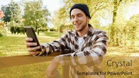  Presentation with man holding phone - Theme having young-smiling-man-wearing-plaid background and a gold colored foreground