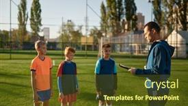  Presentation with kids soccer - Presentation theme having young-soccer-coach-teaching-kids background and a tawny brown colored foreground