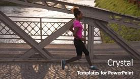 Presentation with morning sunrise - Amazing theme having young sporty african american woman running on sidewalk across the bridge at early morning jogging with city sunrise scene in background backdrop and a dark gray colored foreground