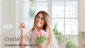  Presentation with hand holding flowers - Beautiful PPT layouts featuring young woman at home holding pink tulips flowers very happy pointing with hand and finger to the side backdrop and a soft green colored foreground