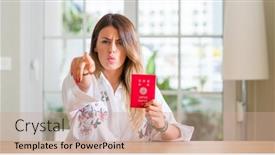  Presentation with passport - Theme having young woman at home holding a passport of japan pointing with finger to the camera and to you hand sign positive and confident gesture from the front background and a coral colored foreground