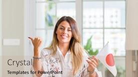  Presentation with japan flag - Presentation theme having young woman at home holding flag of japan pointing with hand and finger up with happy face smiling background and a coral colored foreground