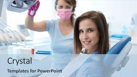  Presentation with dental office - Audience pleasing presentation theme consisting of young woman having dental check backdrop and a light blue colored foreground