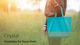  Presentation with tote bag - PPT theme with young-woman-holding-emerald-green background and a yellow colored foreground