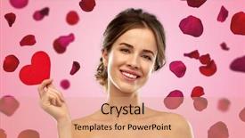  Presentation with pink rose petals - Presentation theme having valentine's day beauty and people concept - happy smiling beautiful young woman holding red heart over pink background and rose petals background and a coral colored foreground
