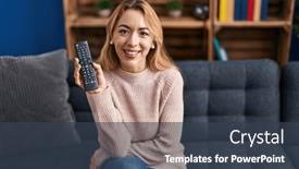  Presentation with remote - PPT theme consisting of young-woman-holding-tv-remote background and a tawny brown colored foreground