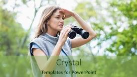  Presentation with binocular - PPT layouts having young woman looking away while holding binocular at forest background and a seafoam green colored foreground