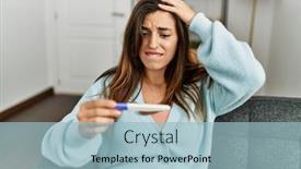  Presentation with pregnancy - PPT theme featuring young-woman-looking-pregnancy-test background and a light blue colored foreground