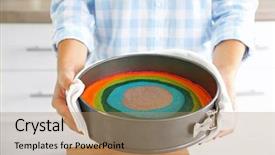  Presentation with rainbow birthday cake - Slide deck with young woman making rainbow cake background and a  colored foreground