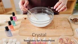  Presentation with essential oil - Cool new slide deck with young woman pouring essential oil from small bottle into liquid soap mass in glassware while working in studio backdrop and a coral colored foreground