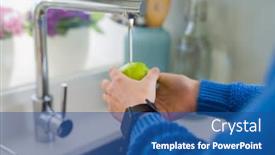  Presentation with fruit water - Amazing slide deck having young woman washing vegetables and fruit using water from sink backdrop and a ocean colored foreground