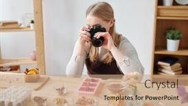  Presentation with soap - Presentation theme with young woman with photocamera photographing handmade soap and ingredients on table in studio background and a coral colored foreground