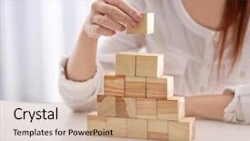  Presentation with cube - Audience pleasing PPT theme consisting of young woman with wooden cubes backdrop and a coral colored foreground