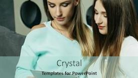  Presentation with computer room - Presentation theme with young women relaxing on the living room floor looking at a laptop computer and laughing at something on the screen background and a mint green colored foreground