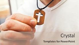  Presentation with wooden christian cross religious concept - Amazing PPT theme having catholic youth - wooden cross necklace on man's backdrop and a soft green colored foreground