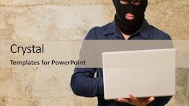  Presentation with laptop - Presentation with youth crime - young male thief holding laptop background and a soft green colored foreground