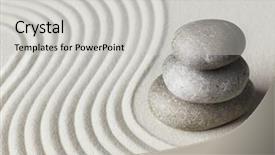  Presentation with zen stone - Theme having zen stone in the sand background and a light gray colored foreground