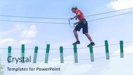  Presentation with obstacles - Audience pleasing PPT theme consisting of zip lining - young man passes obstacles backdrop and a sky blue colored foreground