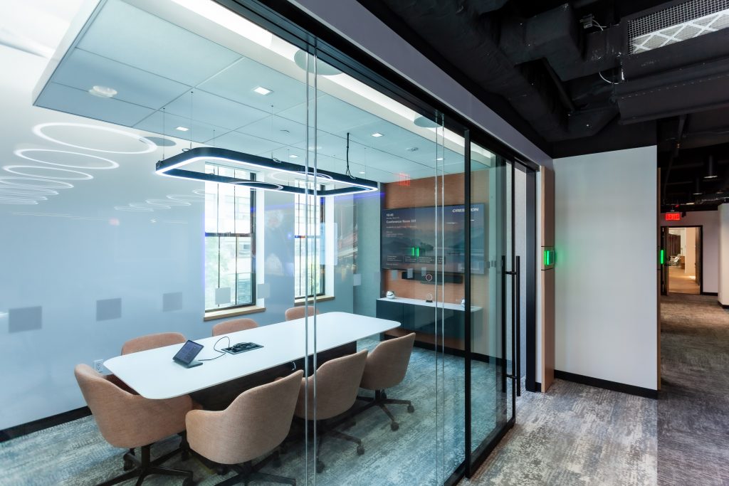 meeting room with display and chairs