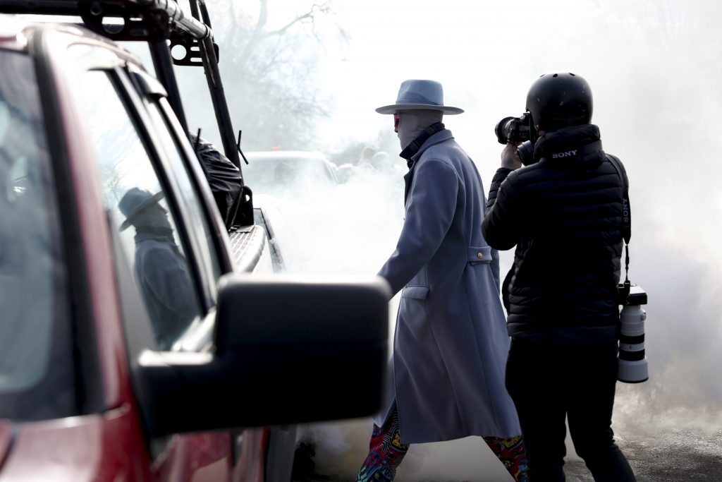 Photographer Capturing Clash