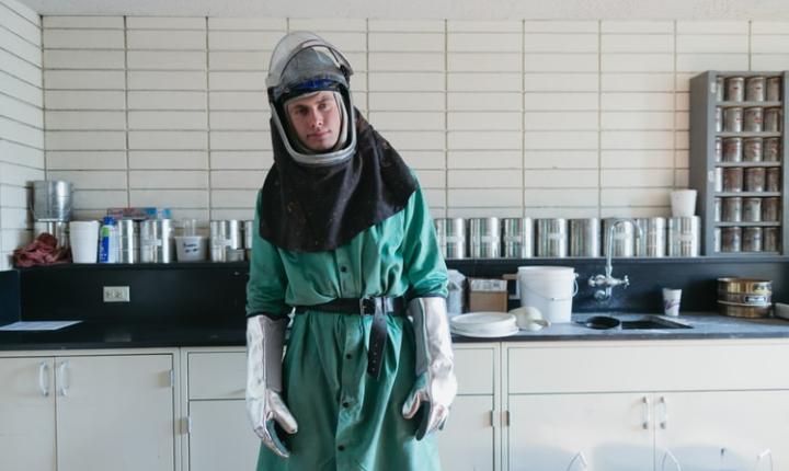 Man in hazardous materials suit