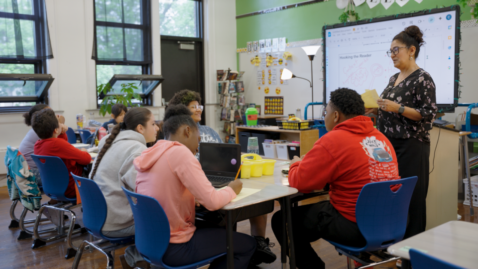 Milwaukee teacher guides students during literacy instruction