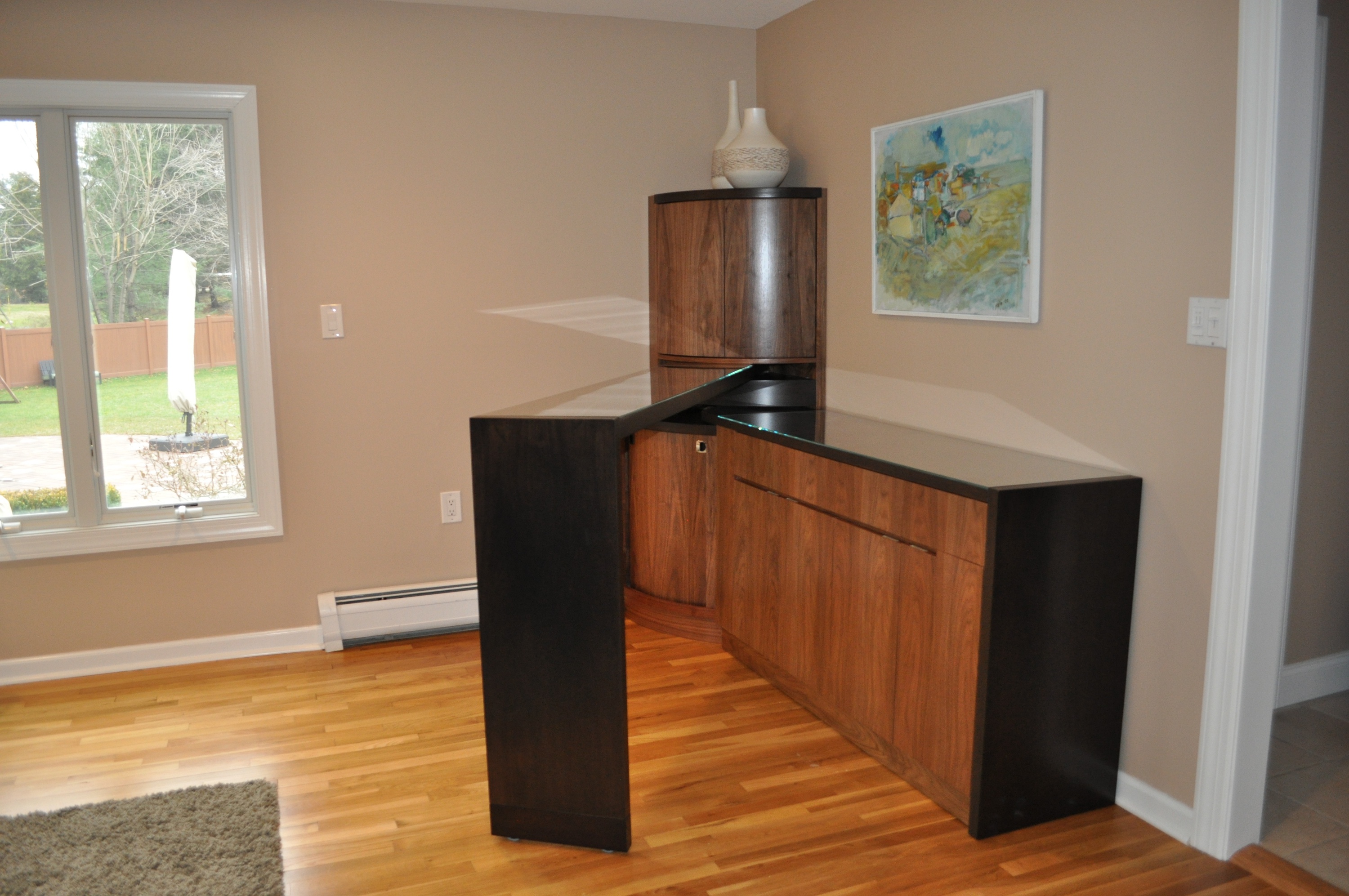Custom rotating bar to enhance small space entertaining!