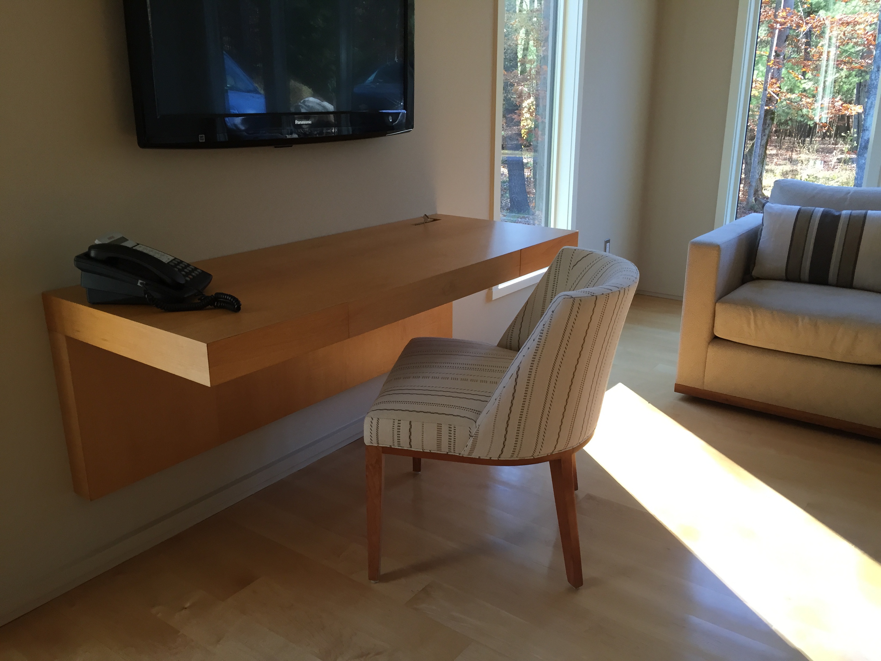 Bespoke floating desk to accommodate specific work style.