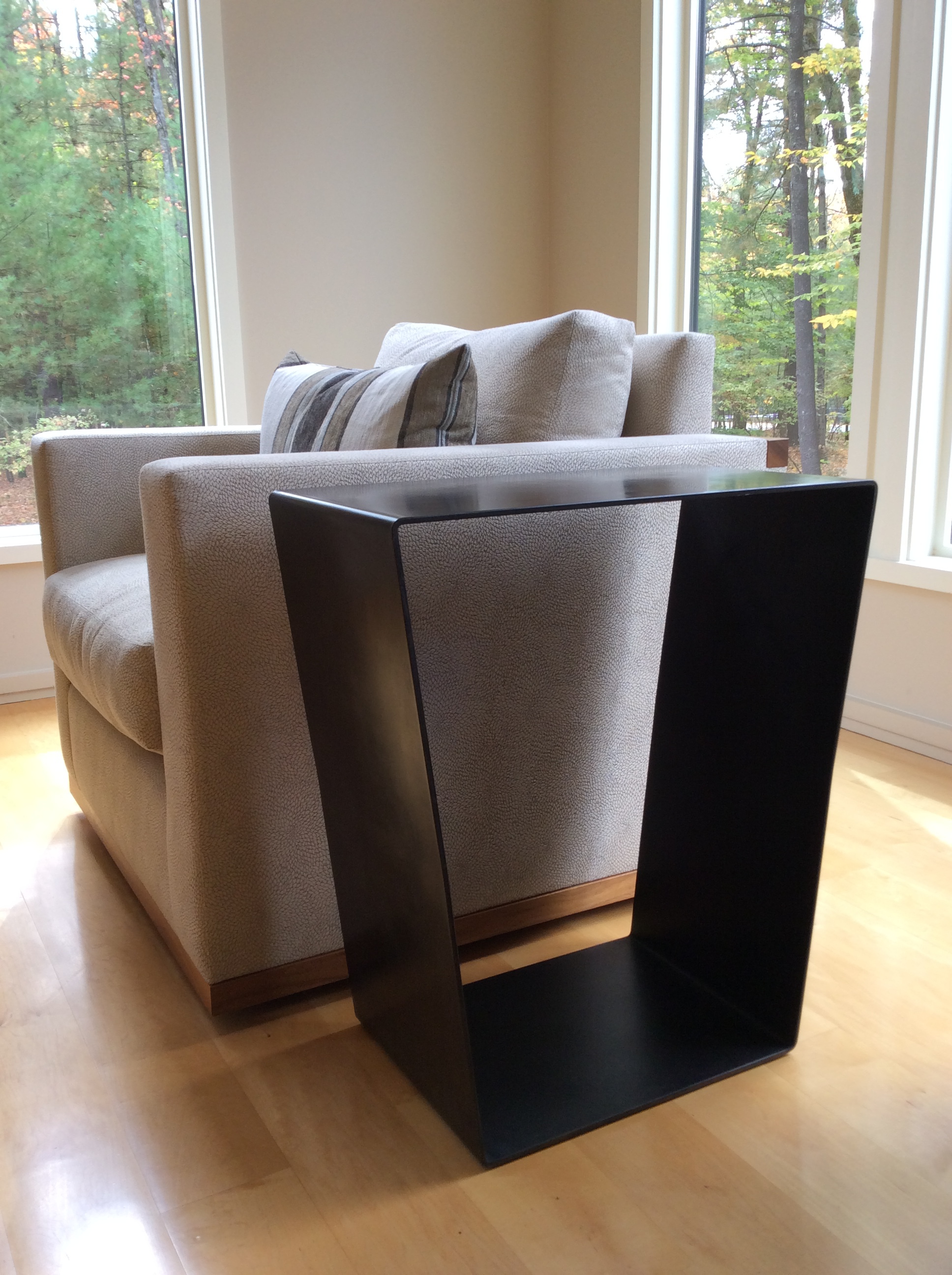 Angled metal side table