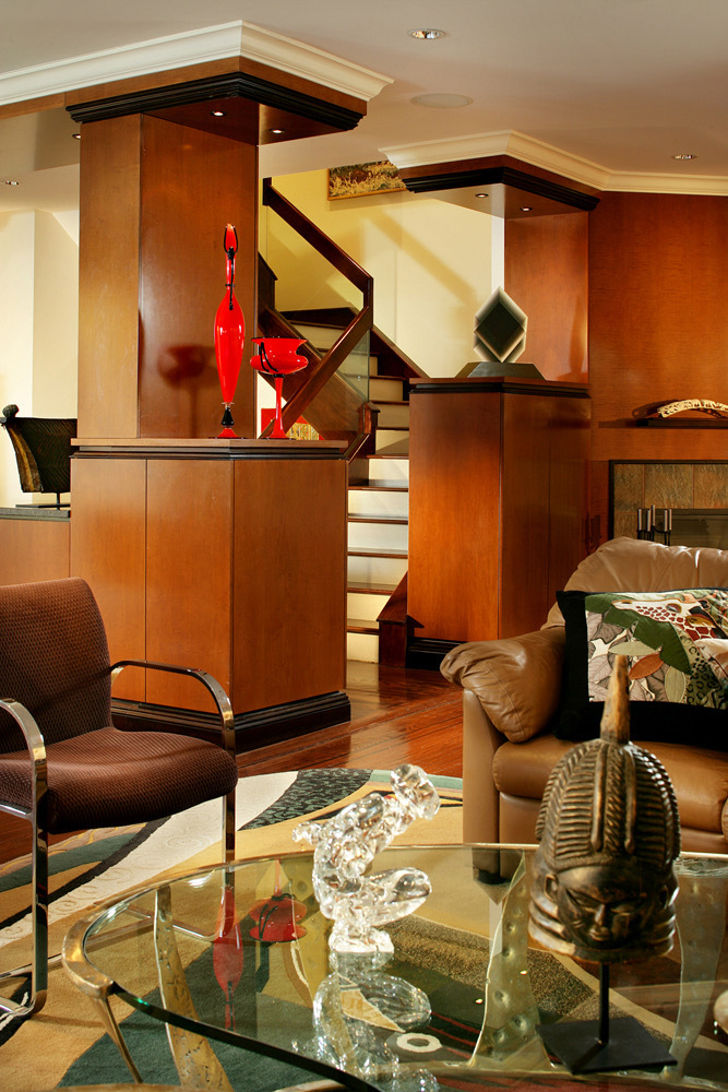 Bespoke room dividers that also function as art display and storage. 