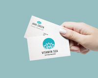 Vitamin sea business card hand