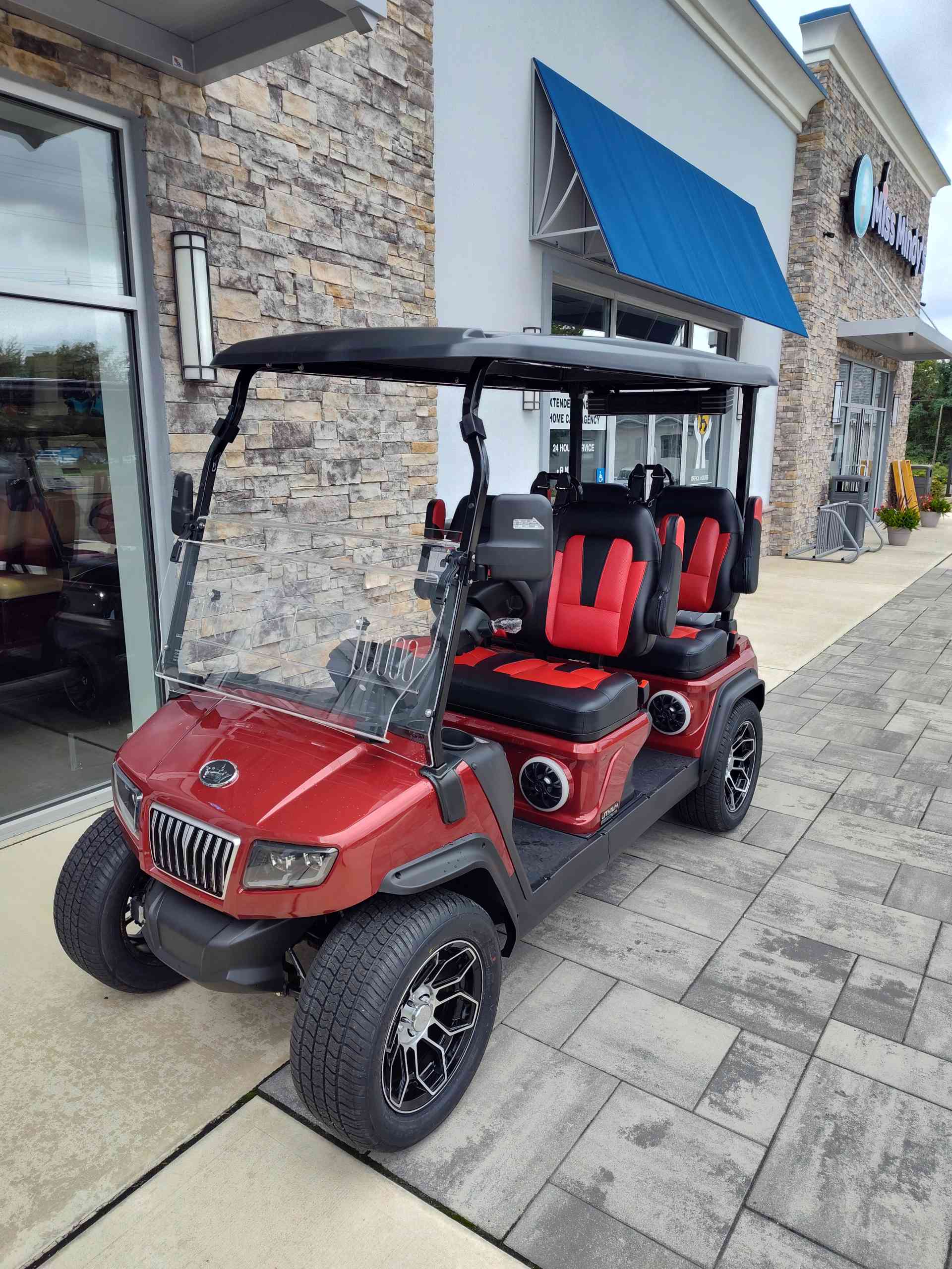 2027 Evolution D5 Ranger 4 PLUS Golf Cart in Flamenco Red for sale at TIGON Bayville, NJ